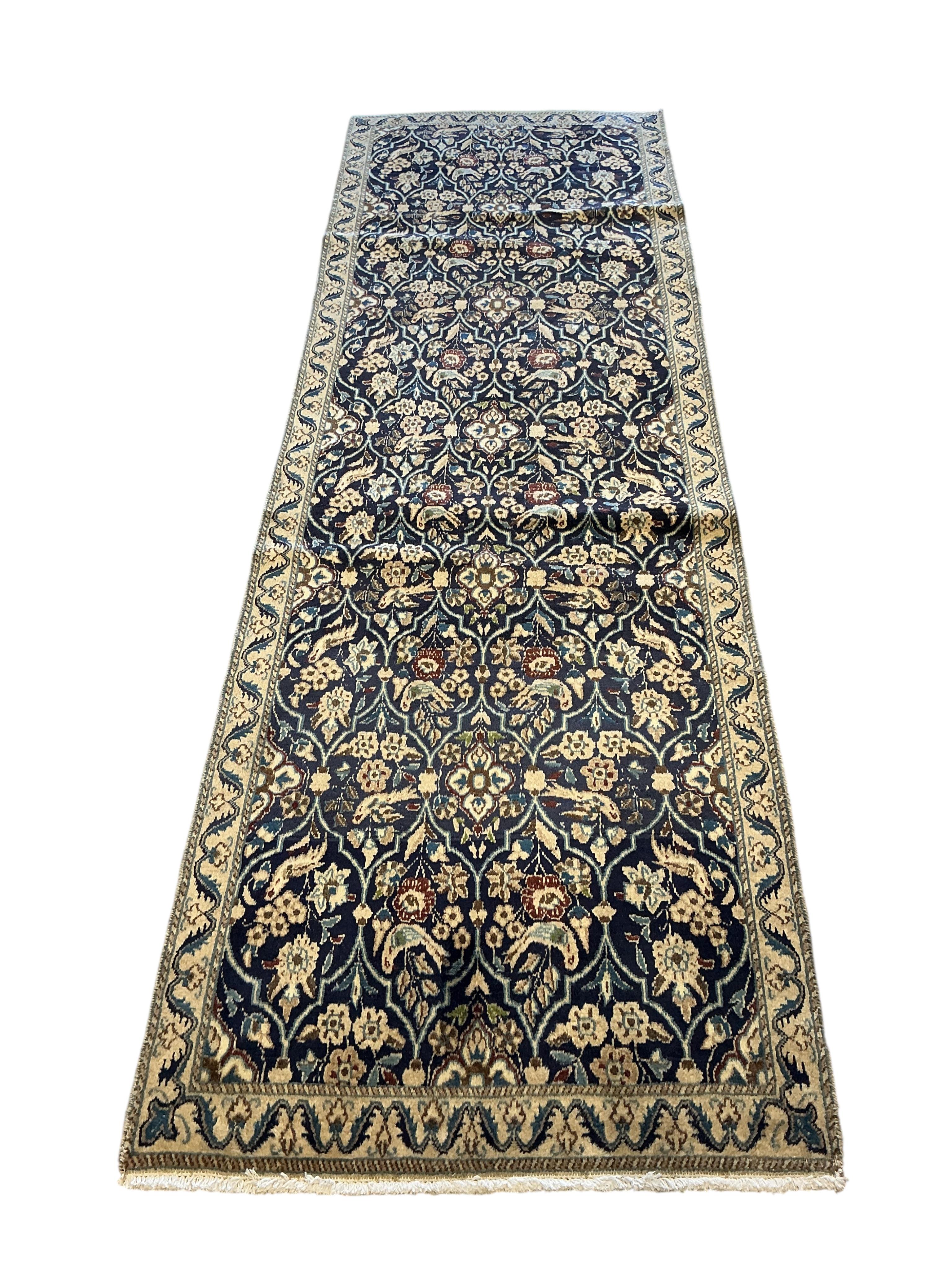A Nain blue ground runner, 280 x 85cm